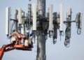 A Verizon crew updates a cell tower to handle the 5G network in Orem, Utah in December 2019 (Photo: AFP/File/GEORGE FREY)