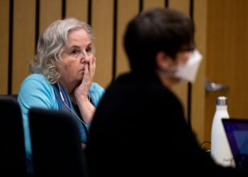 Nancy Crampton Brophy, left, accused of killing her husband Dan Brophy in June of 2018, is seen in court during her trial in Portland, Ore., Tuesday, April 5, 2022. The trial of the self-published romance writer accused of fatally shooting her chef husband started Monday. She has remained in custody since her arrest in September 2018, facing a murder charge in the death of Daniel Brophy, 63, The Oregonian/OregonLive reported. The trial is expected to last seven weeks. (Dave Killen/The Oregonian via AP, Pool)