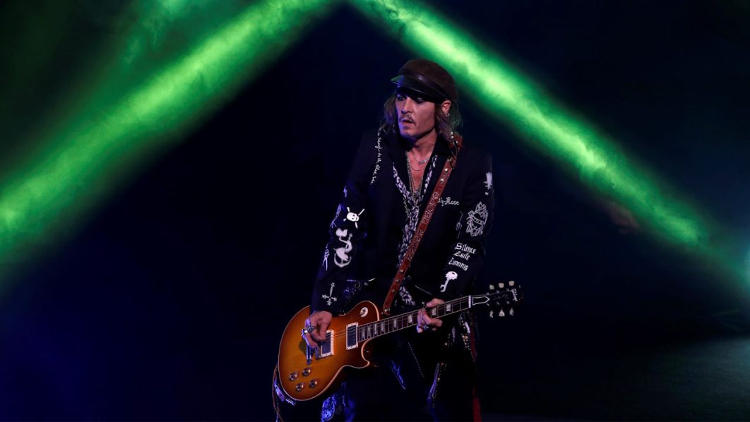 (FILES) This file photograph taken on July 5, 2018, shows US actor Johnny Depp performing with The Hollywood Vampires band during the 52th Montreux Jazz Festival in Montreux. (Photo by Stefan WERMUTH / AFP)
