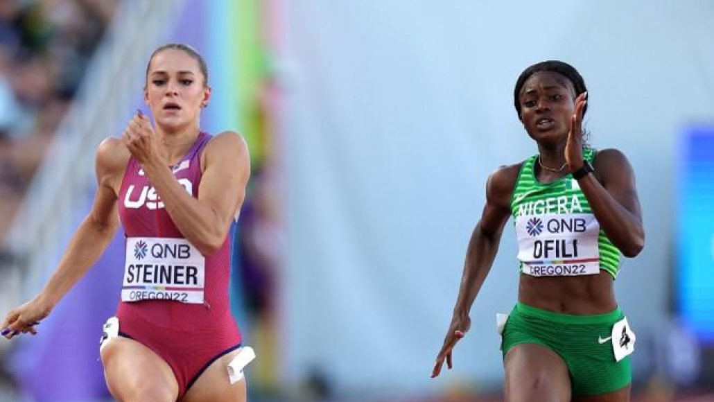 EUGENE, OREGON – JULY 19: Abby Steiner of Team United States and Favour Ofili of Team Nigeria compete in the Women’s 200m Semi-Final on day five of the World Athletics Championships Oregon22 at Hayward Field on July 19, 2022 in Eugene, Oregon. Carmen Mandato/Getty Images/AFP (Photo by Carmen Mandato / GETTY IMAGES NORTH AMERICA / Getty Images via AFP)