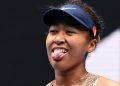 In this file photo, Japan’s Naomi Osaka reacts after a point against France’s Alize Cornet during their women’s singles match at the Melbourne Summer Set tennis tournament in Melbourne on January 4, 2022. William WEST / AFP