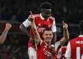 Arsenal’s Swiss midfielder Granit Xhaka (C) celebrates with teammates after scoring the opening goal of the UEFA Europa League Group A football match between Arsenal and PSV Eindhoven at The Arsenal Stadium in London, on October 20, 2022. (Photo by ADRIAN DENNIS / AFP)