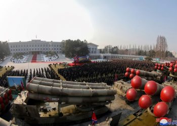 This picture taken on December 31, 2022 and released from North Korea’s official Korean Central News Agency (KCNA) on January 1, 2023 shows a ceremony of donating 600mm Super-large Multiple Launch Rocket System in the yard of the headquarters of the Central Committee of the Workers’ Party of Korea in Pyongyang. (Photo by STR / KCNA VIA KNS / AFP)