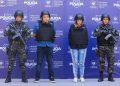 This handout picture released by El Salvador’s National Civil Police shows Colombian Margaret Chacon (2-R), 42, and Salvadoran Wilber Huezo (2-L), 47, after being detained by the National Civil Police in San Salvador on January 18, 2023. – Salvadoran authorities captured Colombian national Margaret Chacon Zuniga on Wednesday for allegedly being involved in the murder of Paraguayan anti-Mafia prosecutor Marcelo Pecci in May 2022 in Colombia, an official source said. Along with her was arrested the Salvadoran Wilber Huezo, whom the authorities claim to have hidden Chacon Zuniga in the country. (Photo by – / NATIONAL CIVIL POLICE / AFP)/