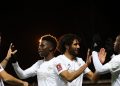 Arsenal’s English striker Eddie Nketiah (R) celebrates after scoring his team second goal during the FA Cup third round football match between Oxford United and Arsenal at the Kassam Stadium in Oxford, west of London, on January 9, 2023. (Photo by ADRIAN DENNIS / AFP) //