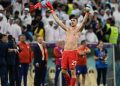 Argentina’s goalkeeper #23 Emiliano Martinez celebrates after qualifying to the next round after defeating Netherlands in the penalty shoot-out of the Qatar 2022 World Cup quarter-final football match between Netherlands and Argentina at Lusail Stadium, north of Doha, on December 9, 2022. (Photo by MANAN VATSYAYANA / AFP)