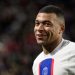 Paris Saint-Germain’s French forward Kylian Mbappe reacts during the French L1 football match between Stade Rennais FC and Paris Saint-Germain (PSG) at the Roazhon Park stadium in Rennes, western France, on January 15, 2023. (Photo by LOIC VENANCE / AFP)