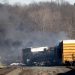 Smoke rises from a derailed cargo train in East Palestine, Ohio, on February 4, 2023. – The train accident sparked a massive fire and evacuation orders, officials and reports said Saturday. No injuries or fatalities were reported after the 50-car train came off the tracks late February 3 near the Ohio-Pennsylvania state border. The train was shipping cargo from Madison, Illinois, to Conway, Pennsylvania, when it derailed in East Palestine, Ohio. (Photo by DUSTIN FRANZ / AFP)