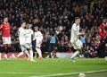 Manchester United’s English striker Jadon Sancho (2nd L) shoots and scores his team second goal during the English Premier League football match between Manchester United and Leeds United at Old Trafford in Manchester, north west England, on February 8, 2023. (Photo by Oli SCARFF / AFP)