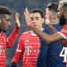 Bayern Munich’s French forward Kingsley Coman (L) celebrates scoring his team’s first goal during first leg of the UEFA Champions League round of 16 football match between Paris Saint-Germain (PSG) and FC Bayern Munich at the Parc des Princes stadium in Paris on February 14, 2023. (Photo by FRANCK FIFE / AFP)