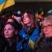 People wave Ukrainian flags as they attend a vigil in Trafalgar Square, central London, on February 23, 2023 to mark one year anniversary of Russiaís invasion of Ukraine. – Ukrainian President Volodymyr Zelensky, on february 23, 2023, expressed confidence in his country’s victory over invading Russian forces with fears mounting of strikes on the war’s first anniversary. The nearly year-long conflict has seen Western leaders step up their support for Kyiv, and G7 ministers discussed new sanctions on Russia as the UN General Assembly prepared to vote on a motion calling for “lasting” peace. (Photo by JUSTIN TALLIS / AFP)
