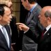 Newly elected Cypriot President Nikos Christodoulides (L) listens to Turkish Cypriot leader Ersin Tatar (R) next to Special Representative and Head of the United Nations Peacekeeping Force in Cyprus Colin William Stewart (2nd R), on February 23, 2023 in Nicosia. (Photo by Iakovos Hatzistavrou / POOL / AFP)