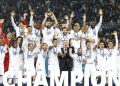 Real Madrid’s players celebrate with the trophy at the end of the FIFA Club World Cup final football match between Spain’s Real Madrid and Saudi Arabia’s Al-Hilal at the Prince Moulay Abdellah Stadium in Rabat on February 11, 2023. – Real Madrid lifted the Club World Cup for a record fifth time with a pulsating 5-3 win over Al-Hilal. (Photo by Khaled DESOUKI / AFP)