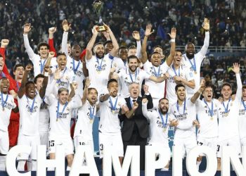 Real Madrid’s players celebrate with the trophy at the end of the FIFA Club World Cup final football match between Spain’s Real Madrid and Saudi Arabia’s Al-Hilal at the Prince Moulay Abdellah Stadium in Rabat on February 11, 2023. – Real Madrid lifted the Club World Cup for a record fifth time with a pulsating 5-3 win over Al-Hilal. (Photo by Khaled DESOUKI / AFP)