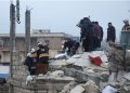 Rescuers search for survivors under the rubble of a damaged building, following an earthquake, in rebel-held Azaz, Syria February 6, 2023. REUTERS/Mahmoud Hassano