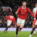 Manchester United’s Dutch striker Wout Weghorst celebrates after scoring his team first goal during the English FA Cup fifth round football match between Manchester United and West Ham at Old Trafford in Manchester, north west England, on March 1, 2023. (Photo by Lindsey Parnaby / AFP)