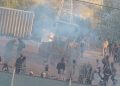 This screen grab taken from a video provided by the Atlanta Police Department shows protesters throwing bricks at a construction site in Atlanta on March 5, 2023. – Atlanta police said at least 35 people were arrested after a protest against a new police training facility nicknamed “Cop City” by opponents, turned violent, with assailants throwing Molotov cocktails and bricks at officers. (Photo by HANDOUT and City of Atlanta Police Department / AFP)