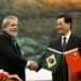 (FILES) In this file photo taken on May 19, 2009, Brazil’s president Luiz Inacio Lula da Silva (L) shakes hands with China’s President Hu Jintao during a signing ceremony at the Great Hall of the People in Beijing. – Brazil President Luiz Inacio Lula da Silva begins a state visit to China on March 26, 2023, with the aim of reinforcing commercial relations and poromoting a peace plan in Ukraine on the agenda. (Photo by JASON LEE / POOL / AFP)