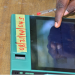 In this file photo, an Independent National Electoral Commission (INEC) official uses a Bimodal Voter Accreditation System (BVAS) to check the details of a voter at a polling station in Maiduguri on February 25, 2023, during Nigeria’s presidential and general election. (Photo by Audu MARTE / AFP)