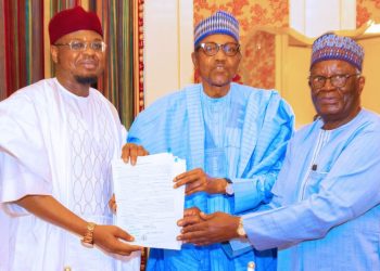 President Muhammadu Buhari flanked by his Chief of Staff, Prof. Ibrahim Gambari (right) and Minister of Communications and Digital Economy, Prof. Isa Pantami after signing the Start-up Bill into law at the State House, Abuja… yesterday. PHOTO: PHILIP OJISUA