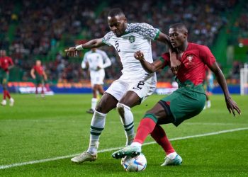 LISBON, PORTUGAL – NOVEMBER 17: Bright Osayi-Samuel of Nigeria competes for the ball with Nuno Mendes of Portugal during the friendly match between Portugal and Nigeria at Estadio Jose Alvalade on November 17, 2022 in Lisbon, Portugal. (Photo by Jose Manuel Alvarez/Quality Sport Images/Getty Images)