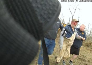 This still image from a March 12, 2023, police bodycam video released by the Pickaway County, Ohio, Sheriff’s Office shows the injured owner of a zebra being taken to an ambulance after the animal attacked him. (Photo by Handout / Pickaway County Sheriff’s Office / AFP)