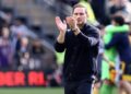Chelsea’s English caretaker manager Frank Lampard applauds fans on the pitch after the English Premier League football match between Wolverhampton Wanderers and Chelsea at the Molineux stadium in Wolverhampton, central England on April 8, 2023. – Wolves won the game 1-0. (Photo by Darren Staples / AFP)