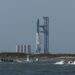 The SpaceX Starship rocket stands on the launchpad from the SpaceX Starbase in Boca Chica as seen from South Padre Island, Texas on April 17, 2023. – SpaceX on Monday postponed the first test flight of Starship, the most powerful rocket ever built.Liftoff of the giant rocket was called off just minutes ahead of the scheduled launch time because of a pressurization issue, SpaceX officials said. (Photo by Patrick T. Fallon / AFP)
