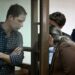 US journalist Evan Gershkovich, arrested on espionage charges, is seen inside a defendants’ cage before a hearing to consider an appeal on his arrest at the Moscow City Court in Moscow on April 18, 2023. (Photo by NATALIA KOLESNIKOVA / AFP)