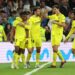 Villarreal’s Nigerian midfielder Samuel Chukwueze (L) celebrates scoring his team’s third goal during the Spanish league football match between Real Madrid CF and Villarreal CF at the Santiago Bernabeu stadium in Madrid on April 8, 2023. (Photo by Pierre-Philippe MARCOU / AFP)