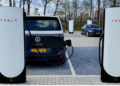 Tesla’s V4 Supercharger now supports non-Tesla EV charging, like this all-electric VW ID Buzz.