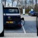 Tesla’s V4 Supercharger now supports non-Tesla EV charging, like this all-electric VW ID Buzz.