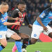 AC Milan’s Portuguese forward Rafael Leao (C) challenges Napoli’s Slovakian midfielder Stanislav Lobotka (L) and Napoli’s French midfielder Tanguy Ndombele during the UEFA Champions League quarter-finals second leg football match between SSC Napoli and AC Milan on April 18, 2023 at the Diego-Maradona stadium in Naples. (Photo by Alberto PIZZOLI / AFP)