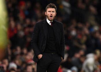(FILES) Manchester United’s English caretaker manager Michael Carrick gestures on the touchline during the English Premier League football match between Manchester United and Arsenal at Old Trafford in Manchester, north west England, on December 2, 2021. – Former Manchester United star Michael Carrick is aiming to cap his remarkable first season as a manager by leading Middlesbrough into the Premier League. Carrick’s side travel to Coventry for the first leg of the Championship play-off semi-finals on Sunday. (Photo by Oli SCARFF / AFP)