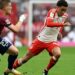 Bayern Munich’s midfielder Jamal Musiala (R) and Leipzig’s defender Marcel Halstenberg vie for the ball during the German first division Bundesliga football match between FC Bayern Munich and RB Leipzig in Munich, southern Germany, on May 20, 2023. (Photo by Christof STACHE / AFP)