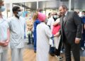 French Health Minister Francois Braun (R) salutes hospital employees after a moment of silence at the Hopital Europeen Georges-Pompidou (HEGP) in Paris on May 24, 2023, in tribute to a nurse who died following a knife attack at the Reims CHU (Centre hospitalier universitaire – University Hospital). – A minute’s silence is observed on May 24, 2023 in all hospitals in France in tribute to the victim, Carene Mezino, 37, who died after a knife attack on May 22, 2023. (Photo by Bertrand GUAY / AFP)