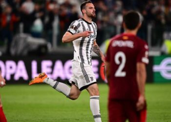 Juventus’ Italian defender Federico Gatti celebrates after scoring an equalizer during the UEFA Europa League semi-final first leg football match between Juventus and Sevilla on May 11, 2023 at the Juventus stadium in Turin. (Photo by Marco BERTORELLO / AFP)