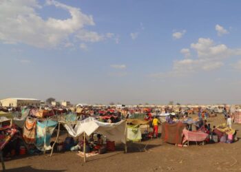 People fleeing the violence arrive in South Sudan.