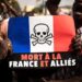 Demonstrators hold up a that reads, “Death to France and its allies”, during a mass demonstration, in Bamako, January 14, 2022. (AFP)