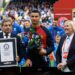 Portugal’s forward Cristiano Ronaldo (C) is honoured with a certificate of the Guinness World Records for having achieved 200 goals within almost 20 years of his career, prior to the UEFA Euro 2024 group J qualification football match between Iceland and Portugal in Reykjavik on June 20, 2023. (Photo by Halldor KOLBEINS / AFP)