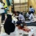 In this picture taken on June 20, 2023, wounded people receive treatment at the al-Bashayer hospital in northern Khartoum. (Photo by – / AFP)
