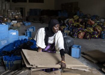 An electoral commission worker packs voting booths in Freetown on June 23, 2023. Sierra Leoneans will vote in a general election on June 24, 2023 with President Julius Maada Bio hoping to secure a second term despite a crippling economic crisis which has sparked deadly protests. The west African country, which never fully recovered economically from a 1991-2002 civil war and the Ebola epidemic a decade later, was further pummelled by the Covid pandemic and fallout from the war in Ukraine. (Photo by JOHN WESSELS / AFP)