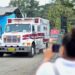 An ambulance leaves the Guayas 1 prison after clashes between inmates in Guayaquil, Ecuador, on July 23, 2023. – Ecuador, the scene of bloody prison massacres, reinforced security in its prisons this Sunday after a new confrontation between inmates in Guayaquil, without the authorities having reported victims, reported the agency in charge of managing prisons, SNAI. (Photo by Gerardo MENOSCAL / AFP)