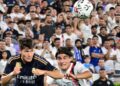 Real Madrid’s Spaniard defender Francisco Garcia (L) fights for the ball with AC Milan’s Argentine midfielder Luka Romero during the friendly football match between Real Madrid and AC Milan at the Rose Bowl in Pasadena, California, on July 23, 2023. (Photo by Frederic J. BROWN / AFP)