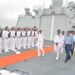 Chinese and Nigerian naval personnel walk aboard a Chinese ship in Lagos.