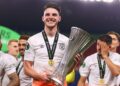 PRAGUE, CZECH REPUBLIC – JUNE 07: Declan Rice of West Ham United kisses the UEFA Europa Conference League trophy after the team’s victory during the UEFA Europa Conference League 2022/23 final match between ACF Fiorentina and West Ham United FC at Eden Arena on June 07, 2023 in Prague, Czech Republic. (Photo by Richard Heathcote/Getty Images)