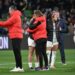 USA’s coach Vlatko Andonovski (2L) comforts his players at the end of the Australia and New Zealand 2023 Women’s World Cup round of 16 football match between Sweden and USA at Melbourne Rectangular Stadium in Melbourne on August 6, 2023. (Photo by WILLIAM WEST / AFP)