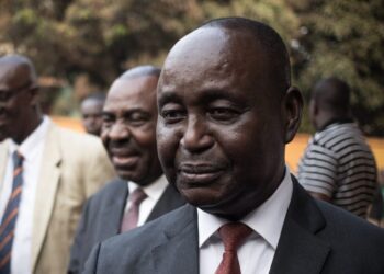 Former Central African Republic President Francois Bozize arrives prior his first press conference since his return at the Kwa Na Kwa headquarters in Bangui, Central African Republic (CAR), on January, 27, 2020. – Former Central African president François Bozizé, now the exiled leader of the main rebel coalition, was sentenced on Thursday to life imprisonment with hard labour in Bangui for “conspiracy” and “rebellion”, according to a ruling sent to AFP on Friday by the Ministry of Justice. (Photo by FLORENT VERGNES / AFP)