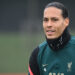 Liverpool’s Dutch defender Virgil van Dijk looks on during a training session at the Liverpool FC training ground in Liverpool, north west England, on April 12, 2022, on the eve of their UEFA Champions League quarter final 2nd leg football match against Benfica. (Photo by Paul ELLIS / AFP)
