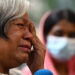 Halinda Binte Ismail, mother of death row convict Mohd Idzwan, reacts while speaking to reporters in Singapore on October 9, 2023. – Families of death row convicts urged the Singapore government on October 9 to impose a moratorium on capital punishment to allow for an independent review of the controversial use of executions in the city-state. (Photo by ROSLAN RAHMAN / AFP)